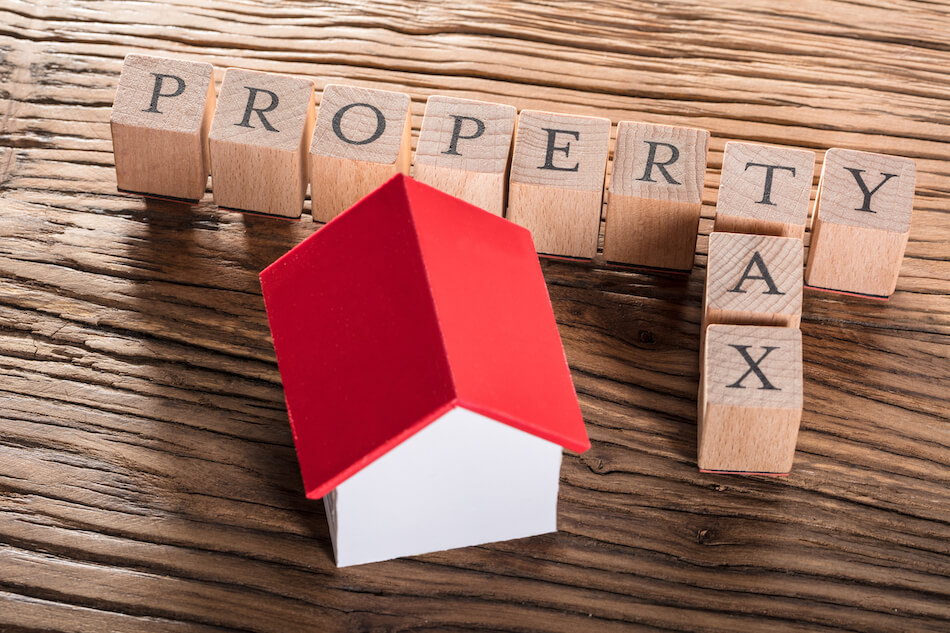 Property Tax spelled with blocks